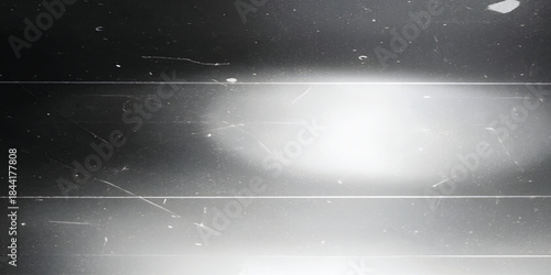 retro film overlay effect with scratch dust and blur light,  retro grain noisy film distressed texture light flare on black background, black and white abstract light background, grunge pattern