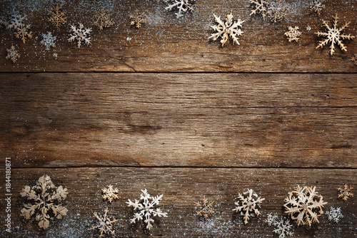 Wood background with snowflakes.