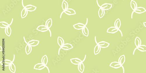 Hand drawn green sprout leaves seamless pattern in soft pastel