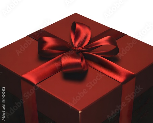 Red gift box with elegant satin ribbon bow on top, isolated on white background