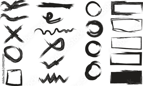 Collection of assorted black ink strokes and shapes on white background