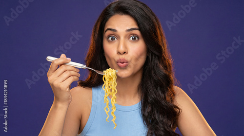 Expressive Young Indian Woman Ready to Enjoy Noodles