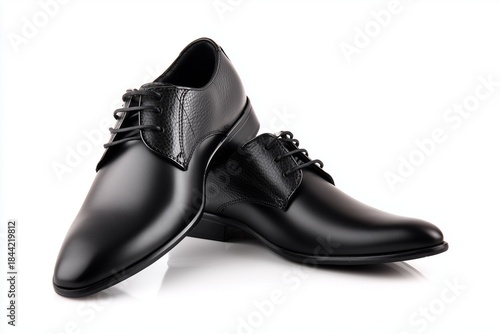 Pair of black male classic shoes isolated on white background, footwear fashion concept