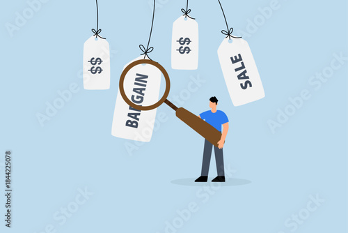 Bargain sale event, man finding special bargain sale price tag.