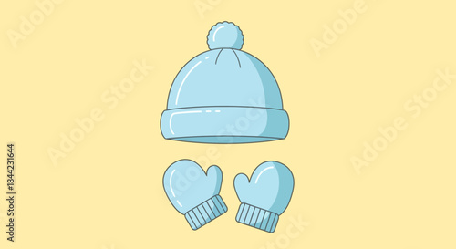 A light blue winter hat and mittens on a yellow background