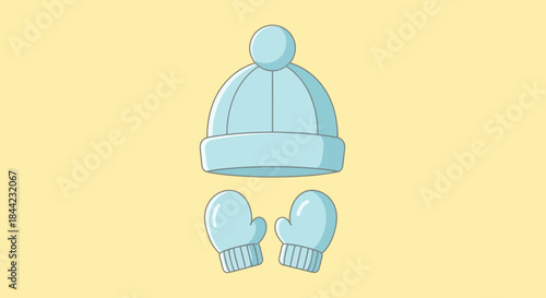 Blue hat with a pompom and blue mittens