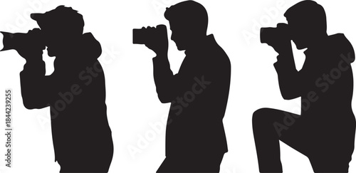 Silhouettes of Photographers in Action Taking Pictures