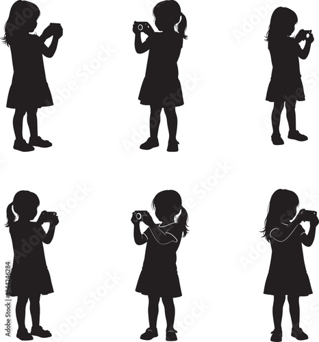 Silhouette of a girl taking pictures with a camera
