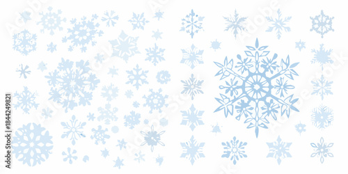 An assortment of delicate pale blue snowflakes scattered across a white background