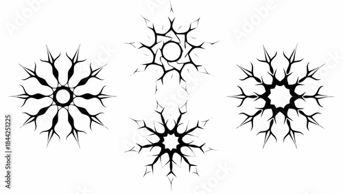 Abstract black starburst shapes and designs on a plain white background