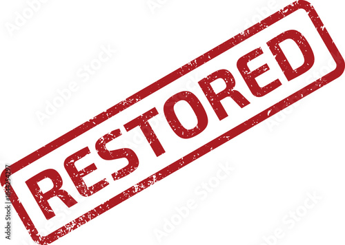 Red grunge stamp with the word RESTORED diagonally on a clean white surface