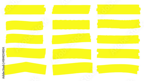 A collection of torn yellow sticky notes arranged on a black background