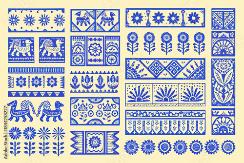 Collection of vintage blue and white polish paper cut folk art patterns