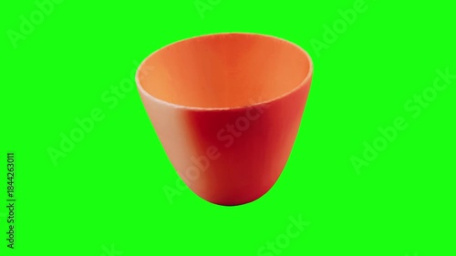 3D Terracotta clay tea cup animated on green screen background.