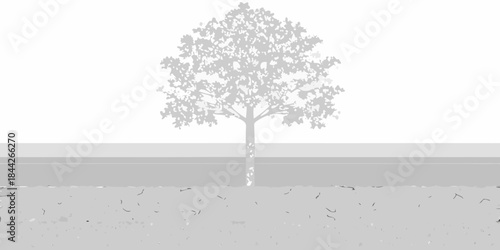 A solitary tree stands against a muted gray and white landscape