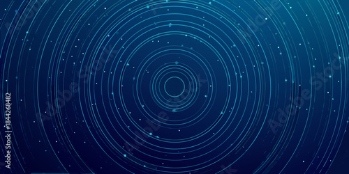 Abstract blue background with concentric circles and scattered sparkling dots
