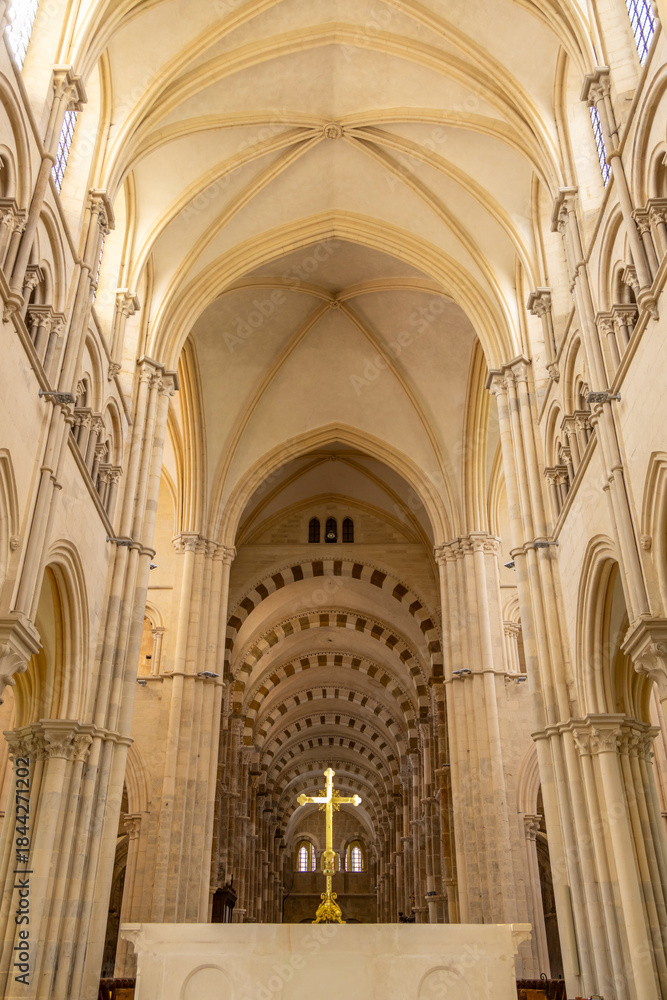 Naklejka premium Vezelay Basilica church interior with golden altar cross