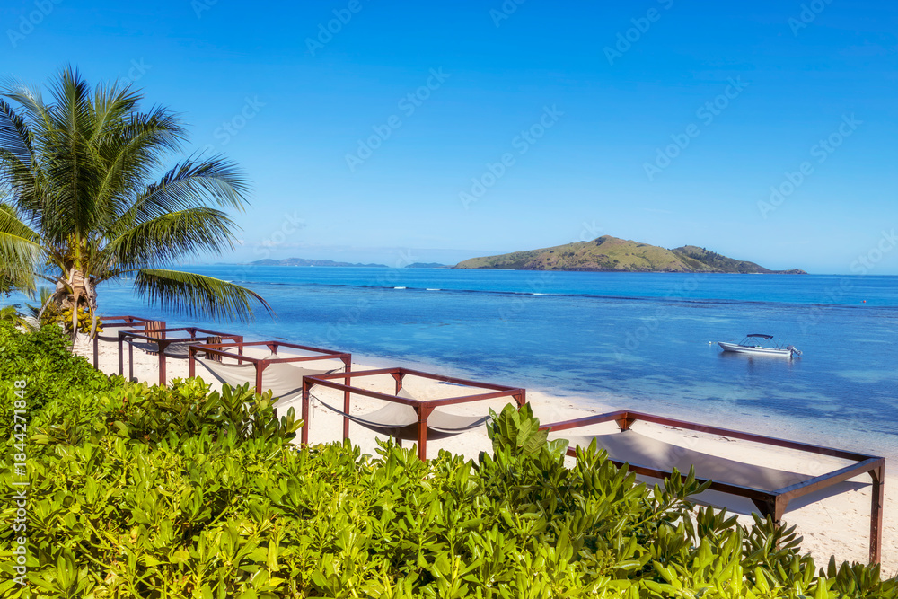 Fototapeta premium Fiji Resort to beach sea bush boat