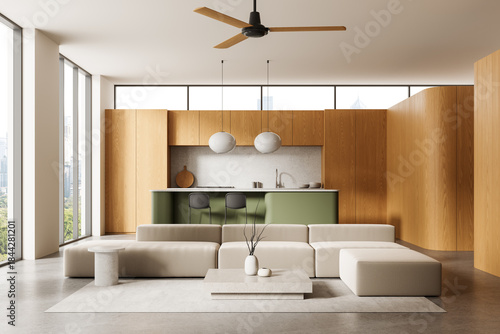 Photos Modern minimalist interior with beige modular sofa, green kitchen island, and wooden cabinetry in bright daylight apartment space