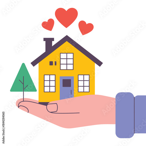 A yellow house with red hearts is held lovingly in a hand