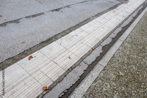 Textured tactile path for visually impaired people in urban environment