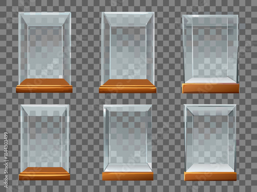 A collection of empty glass display cases with wooden bases showcased