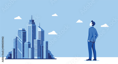 Businessman gazing at a modern city skyline under a blue sky