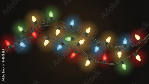 Colorful christmas lights on a string against a dark background for holiday decoration and festive ambiance creation