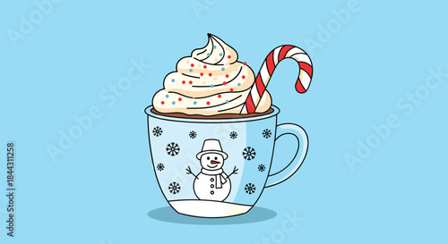 A cozy blue Christmas mug is filled with delicious hot chocolate, topped with whipped cream, sprinkles, and a candy cane.