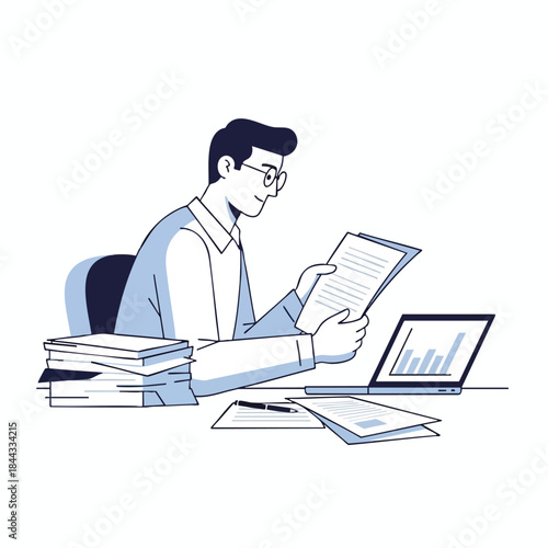 A person with glasses and a shirt looks over documents, a laptop with a graph on a desk