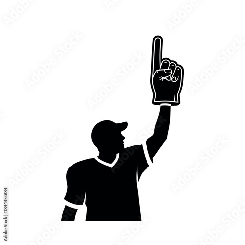 Silhouette of a man wearing a foam finger and pointing up.