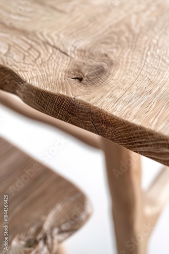Top view of a natural oak dining table showcasing the grain pattern. The surface reveals unique details of the wood, emphasizing its natural qualities. Perfect for home or design use