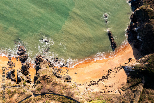 A beautiful coastal landscape. Rocks, ocean, and beach off the coast of Brittany, France.