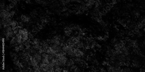 Dark cement wall in retro concept old texture cement dark black gray background, black grunge textur in schwarz mit dreckiger oberflächer, black cracked texture can be used for background.