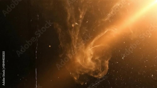 Golden Sunbeam Through Water Droplets on Glass.