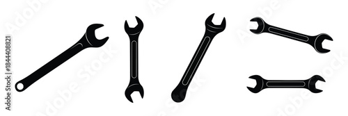 Vector silhouette of set of five black combination wrenches in various orientations