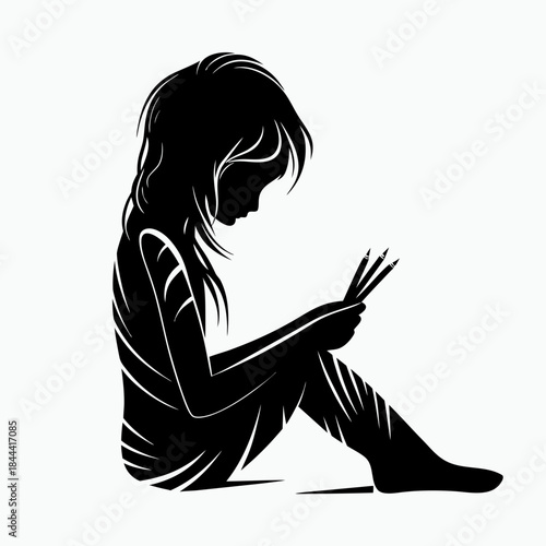 Girl playing with pencils, thoughtful, artistic moment on a plain background