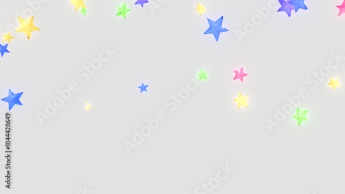 回転しながら落下するカラフルな星