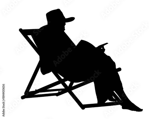 Woman relaxing in a beach chair reading a magazine on a sunny day.