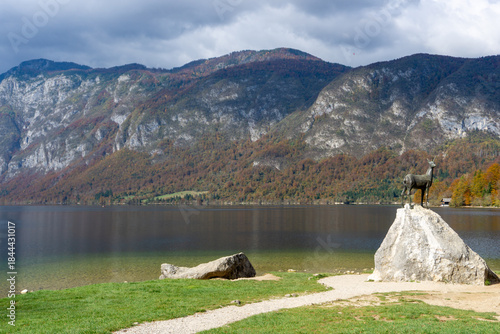Scenic View of Lake Bohinj Featuring the Zlatorog Mythical Ibex Statue in Slovenia
