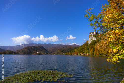 Sunny Panoramic View of Lake Bled with Bled Castle and Church on the Small Island, Slovenia