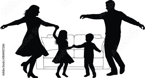Silhouette of a happy family of four dancing around a sofa.