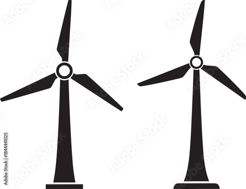 Two wind turbines in silhouette