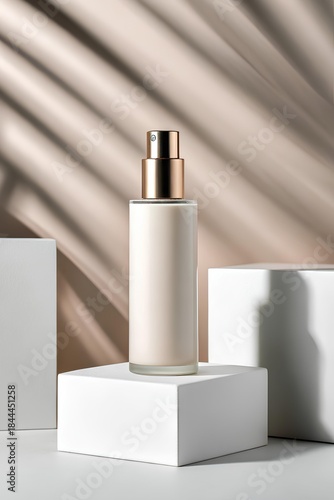 Wallpaper Mural Frosted white cosmetic spray bottle with gold pump on geometric pedestal in soft light and diagonal shadows, showcasing luxury skincare Torontodigital.ca