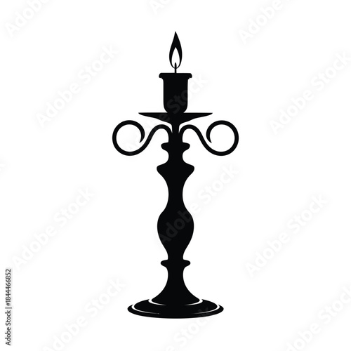 Elegant black silhouette of a lit candlestick with ornate details