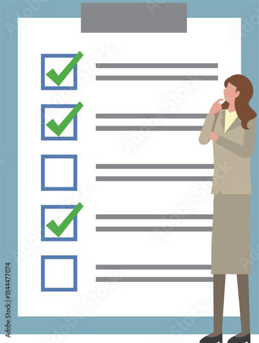 チェックシートを見る女性