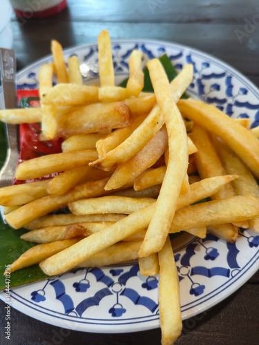 French fries in a fast food restaurant. Fast food. Selective focus.
