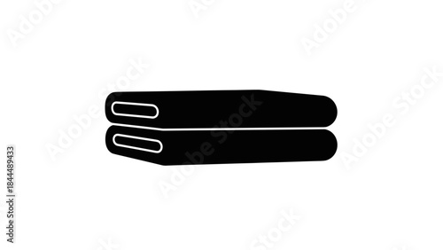 Stack of two folded black towels or blankets.