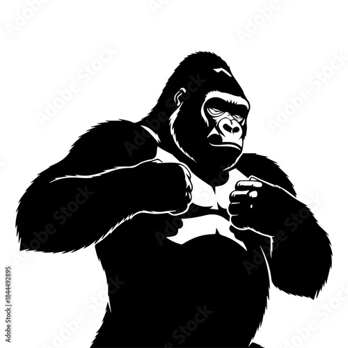 Powerful black silhouette of a gorilla standing with clenched fists, ready for action.