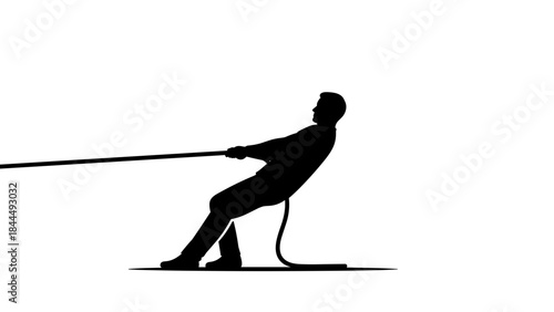 Silhouette of a person pulling a rope with great effort.